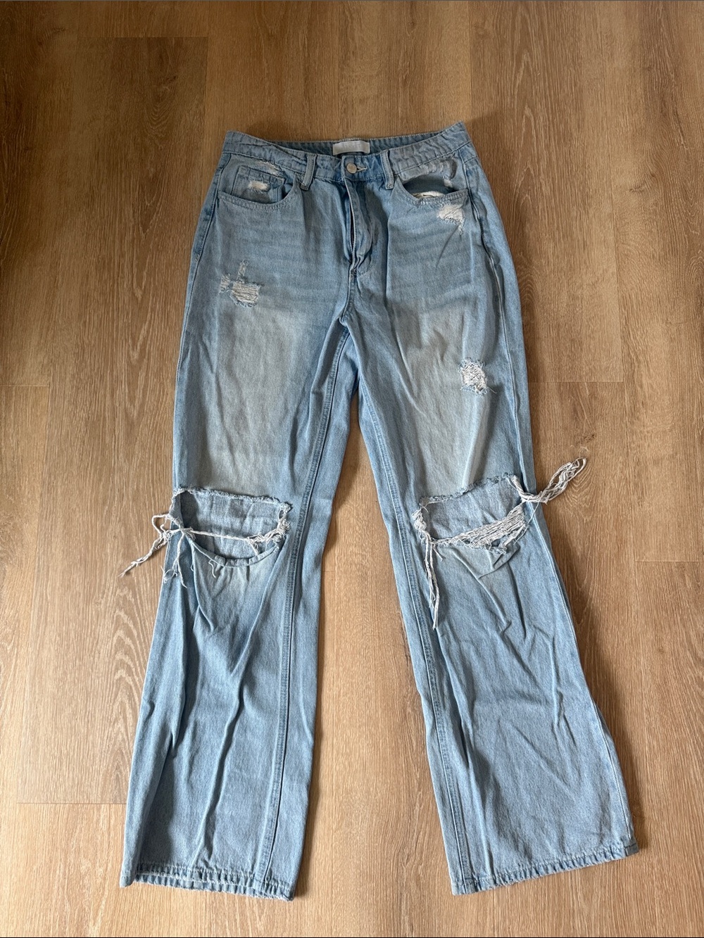 Distressed Light Blue Flare Jeans with Knee Tie Details